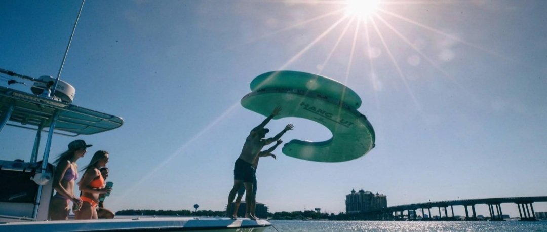 This Giant Curved Inflatable Dock Holds Up To 6 Adults and a Cooler - Image 4